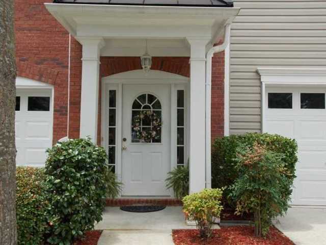 13479 Spring View Drive Milton, GA 30004 - Photo 1 of 1 a front view of a house with garden
