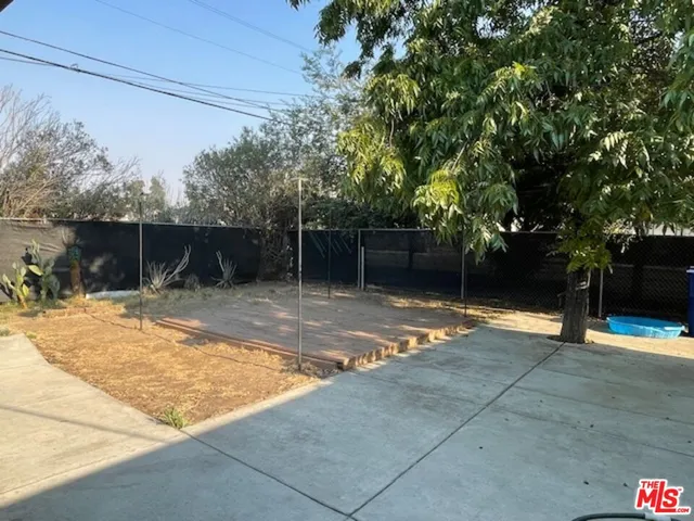 a front view of a house with barbeque