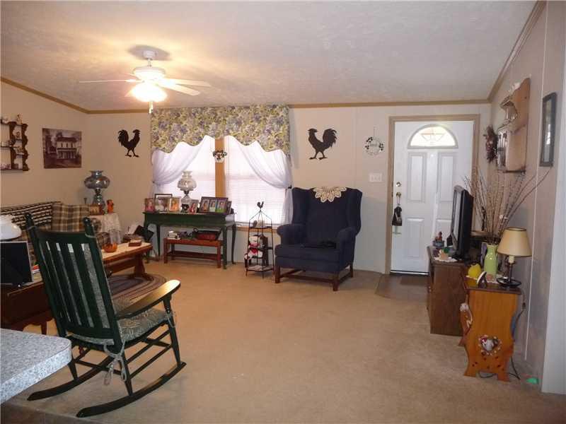 1440 Middle Road New Portland, ME 04961 - Photo 6 of 14 Living Room. As you enter the living...