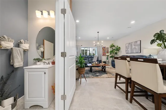 a view of a dining room with furniture and window