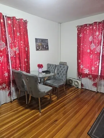 a kitchen with a stove and a refrigerator