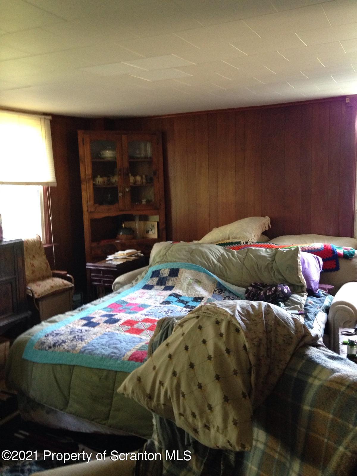 1707 Blaisure Road Montrose, PA 18801 - Photo 4 of 20 a bedroom with a bed and window