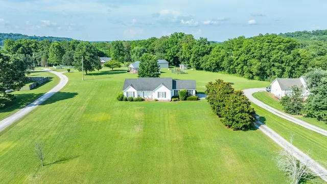 a view of a golf course with chairs