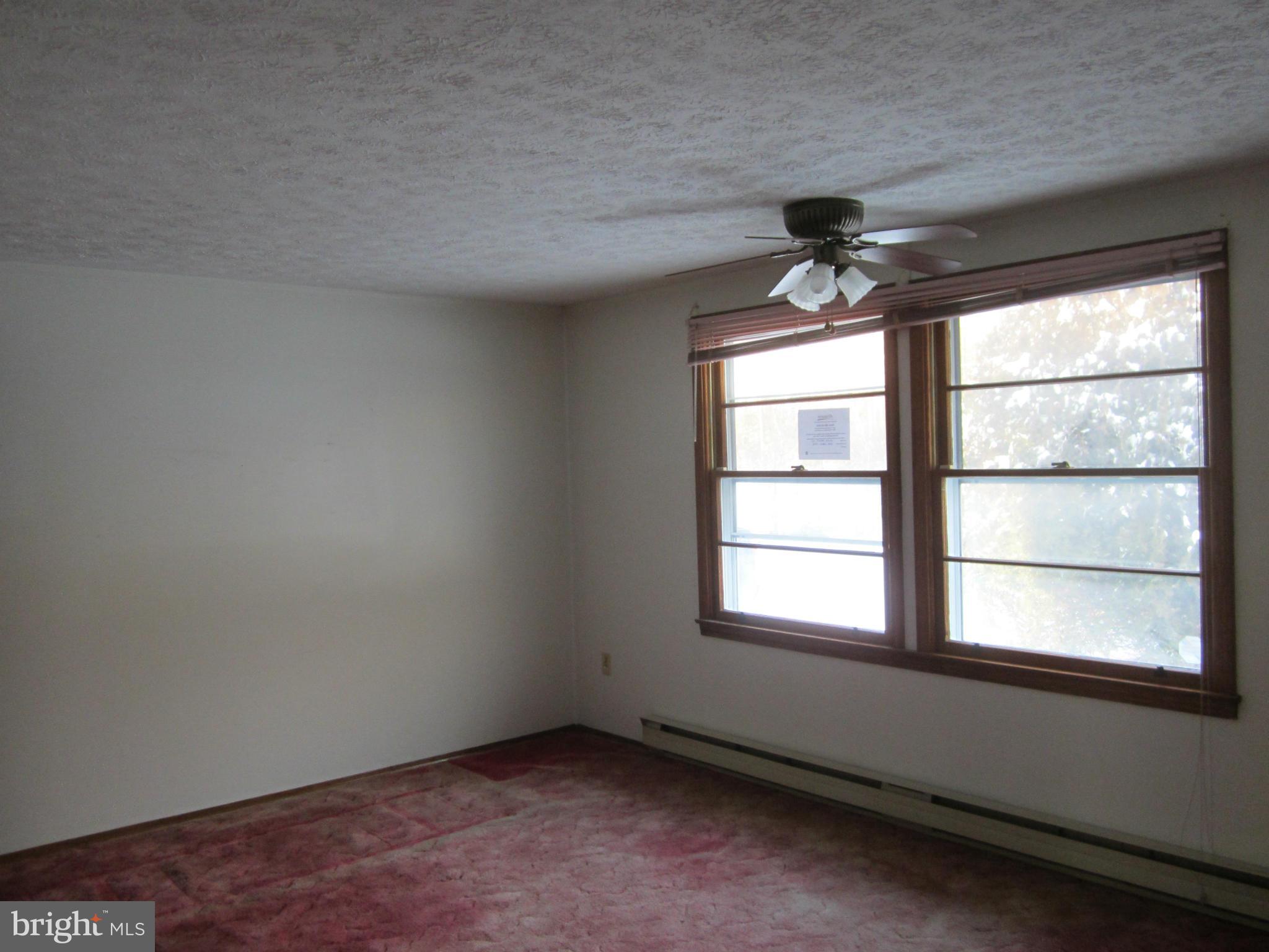 12009 Rousby Hall Road Lusby, MD 20657 - Photo 4 of 10 Living Room
