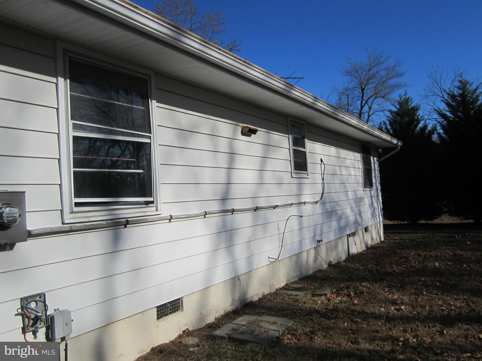 12009 Rousby Hall Road Lusby, MD 20657 - Photo 9 of 10 Exterior (Rear)