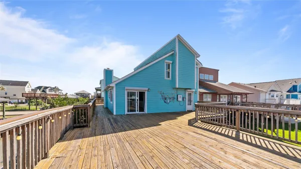 a view of a house with a roof deck