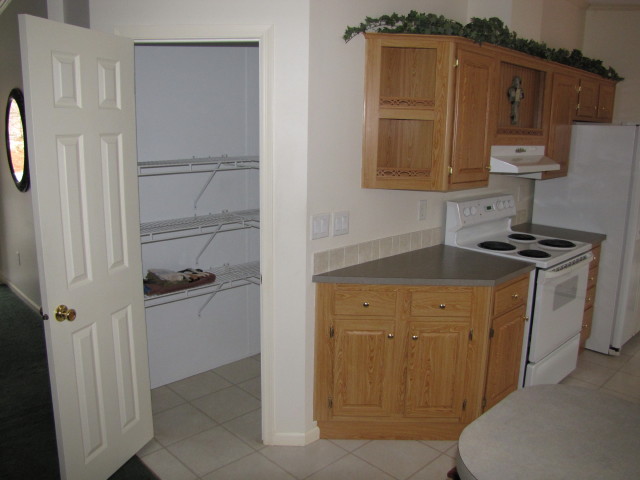 110 Old Post Road Moneta, VA 24121 - Photo 7 of 99 a kitchen with a refrigerator and a stove