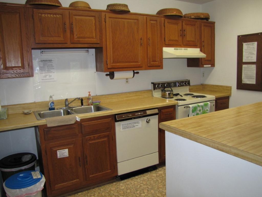 110 Old Post Road Moneta, VA 24121 - Photo 94 of 99 a kitchen with stainless steel appliances granite countertop a sink stove and cabinets
