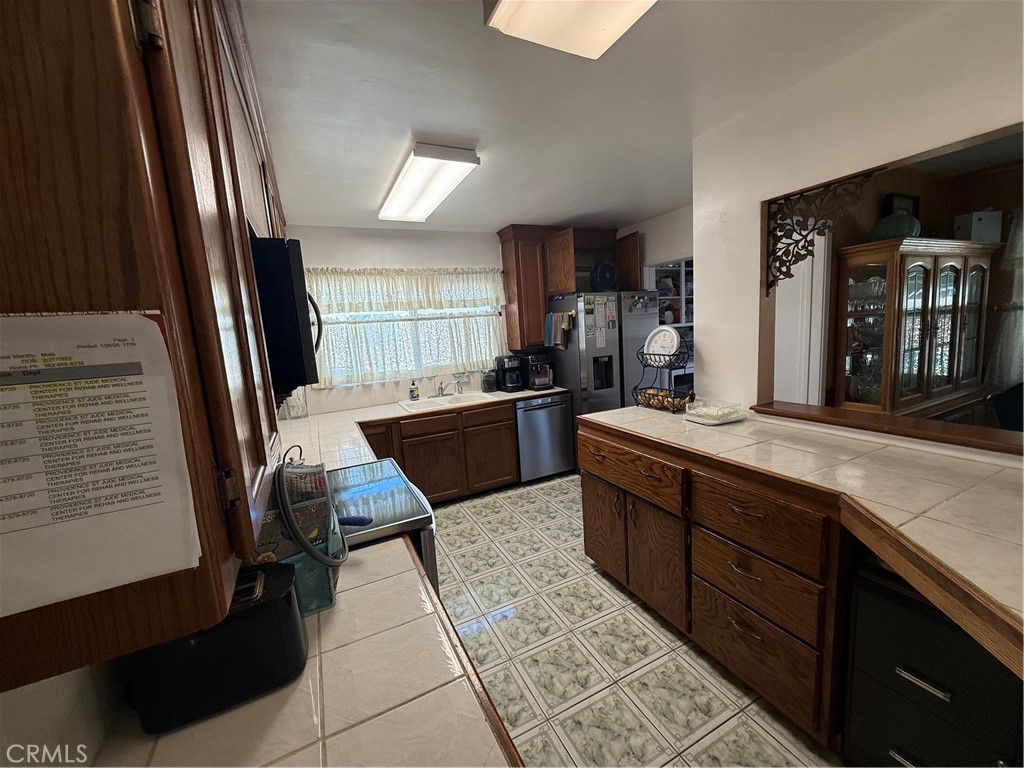 110 Rigsby Street La Habra, CA 90631 - Photo 13 of 41 backed up view from hallway into kitchen
