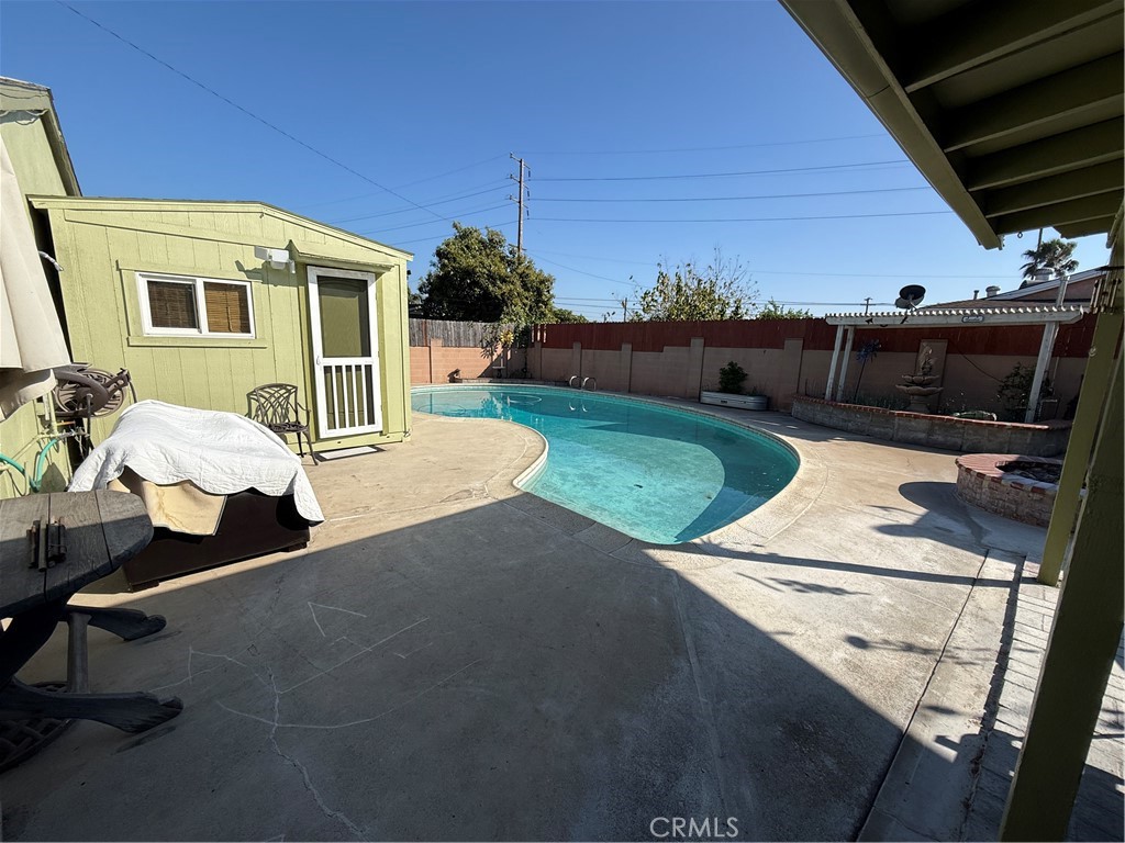 110 Rigsby Street La Habra, CA 90631 - Photo 26 of 41 Large Tough Shed used as office. Great entertaining pool with firepit and outdoor cabana. Shed has electricity , A/C, finished on inside