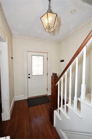 62 Central Street Framingham, MA 01701 - Photo 14 of 23 a view of a livingroom with wooden floor and staircase