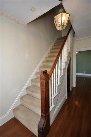 62 Central Street Framingham, MA 01701 - Photo 15 of 23 a view of entryway and hall with wooden floor