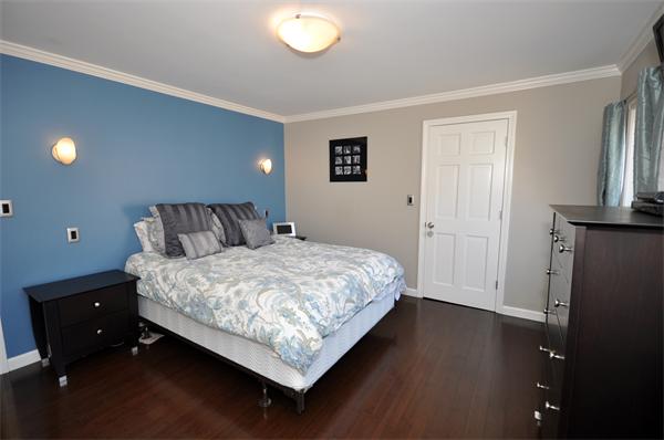 62 Central Street Framingham, MA 01701 - Photo 16 of 23 a bedroom with a bed and a night stand