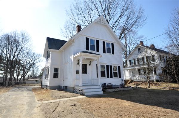62 Central Street Framingham, MA 01701 - Photo 21 of 23 a front view of a house with a yard