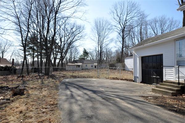 62 Central Street Framingham, MA 01701 - Photo 22 of 23 a view of a yard with a house