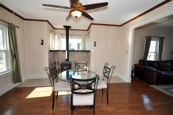 62 Central Street Framingham, MA 01701 - Photo 6 of 23 a view of a dining room with furniture and wooden floor