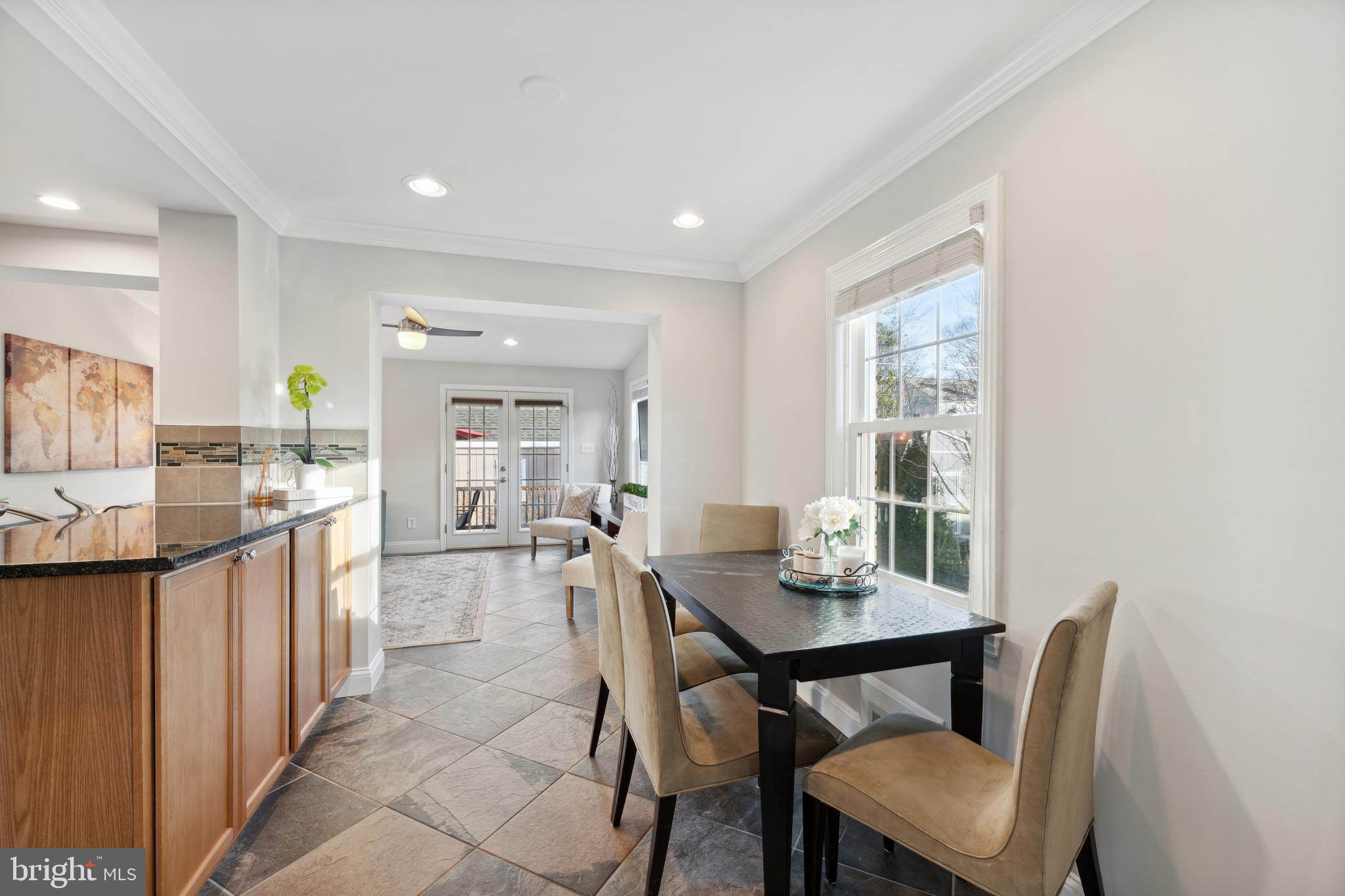 5921 Monticello Road Alexandria, VA 22303 - Photo 39 of 40 Open floor plan dining with slate floors