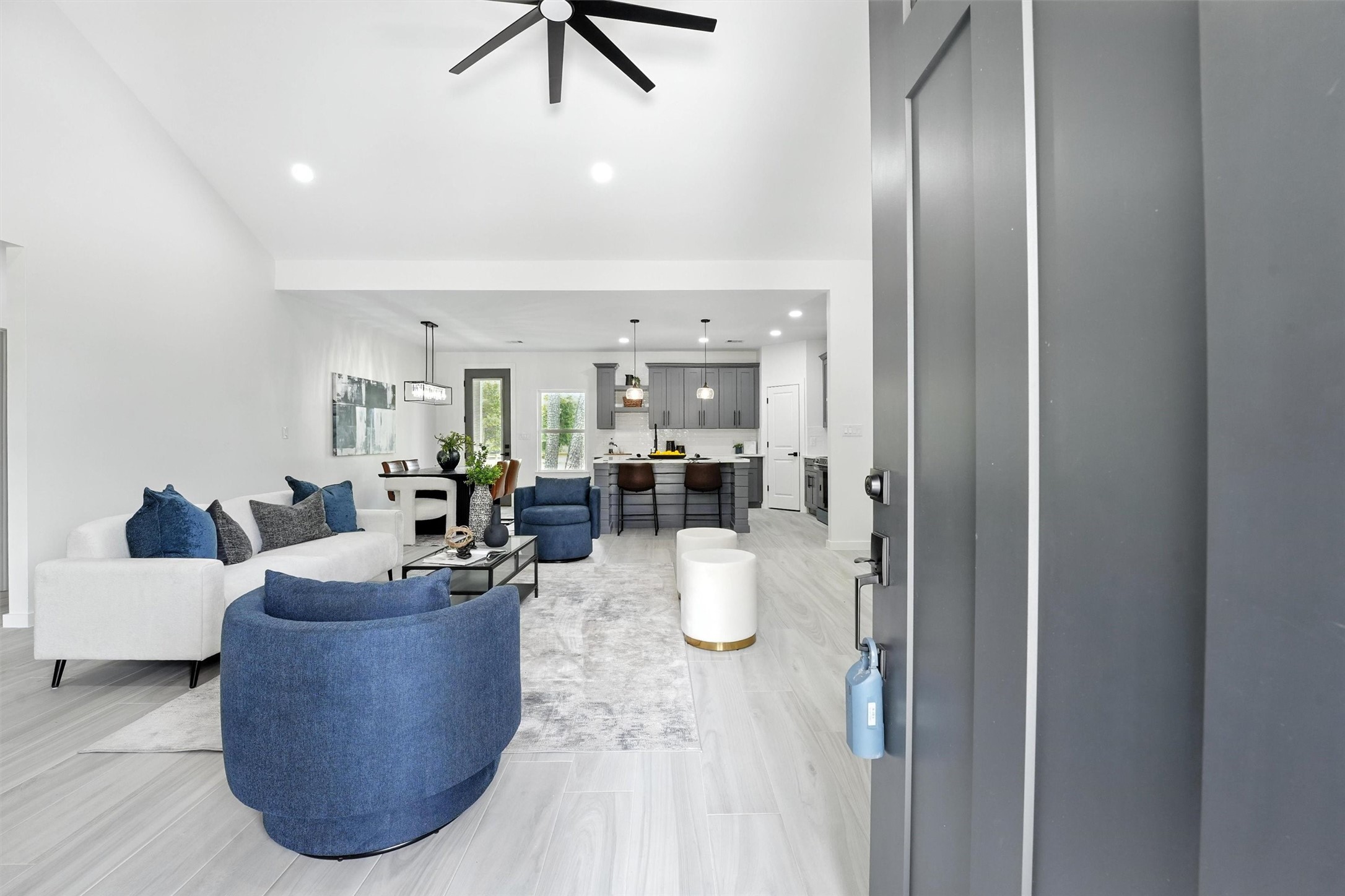 256 Davis Bend Road Alvin, TX 77511 - Photo 20 of 34 a living room with furniture and a chandelier