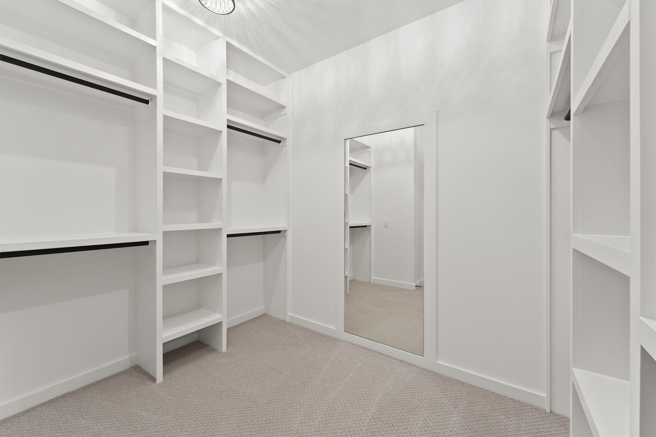 256 Davis Bend Road Alvin, TX 77511 - Photo 21 of 34 a view of an empty walk in closet