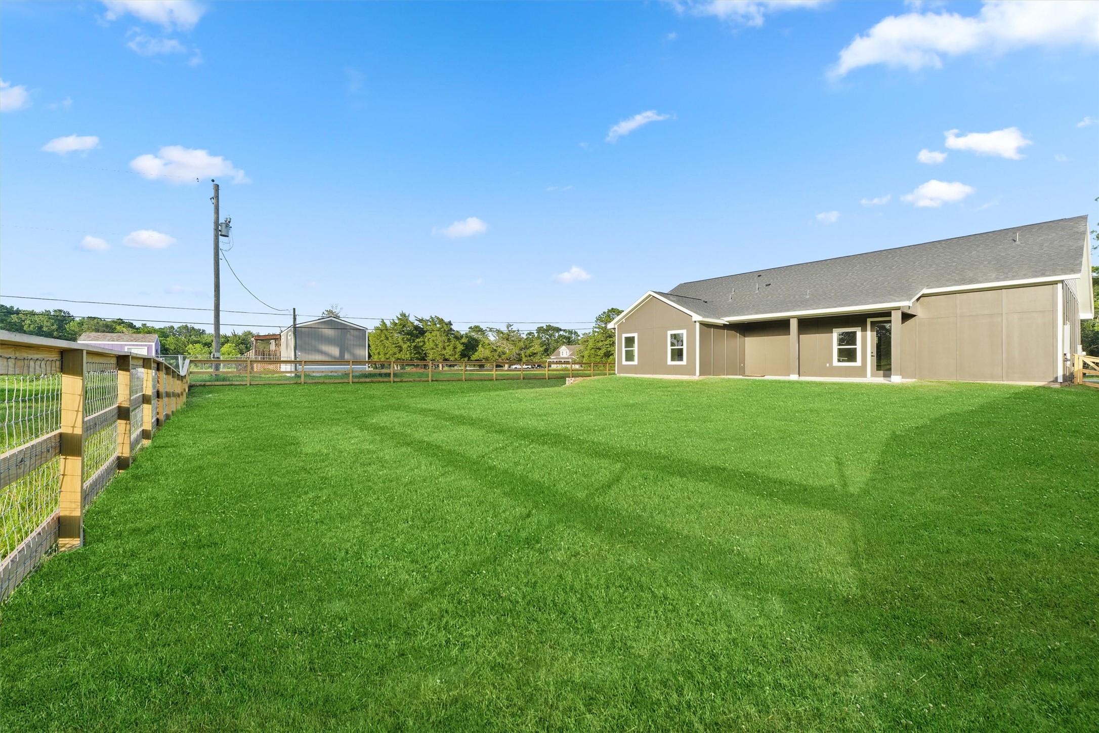 256 Davis Bend Road Alvin, TX 77511 - Photo 32 of 34 a house view with a garden space