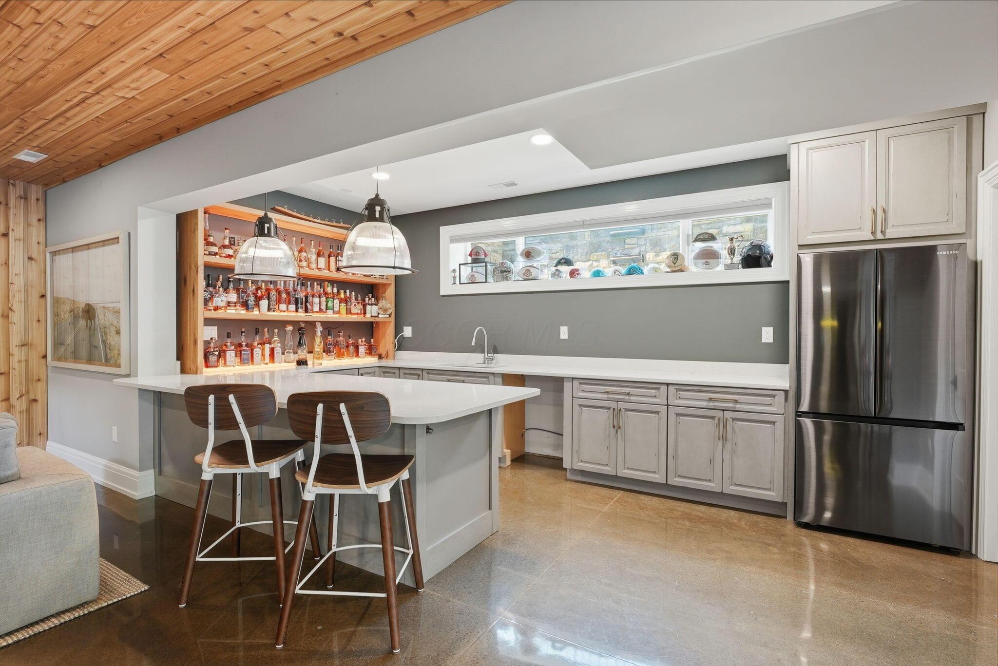10122 Concord Road Dublin, OH 43017 - Photo 71 of 119 Lower Level Bar / Kitchen