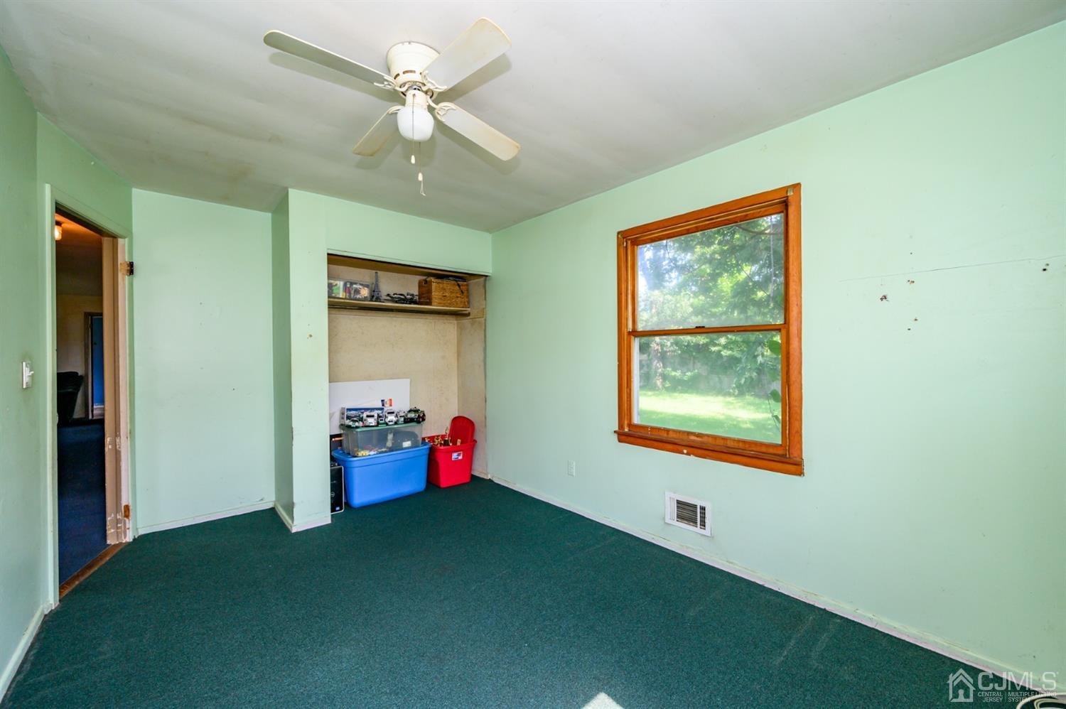 334 Stinson Road Brick, NJ 08723 - Photo 22 of 36 a view of an empty room with a window