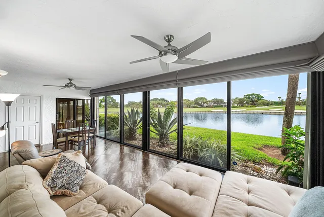 an aerial view of a house with a big yard
