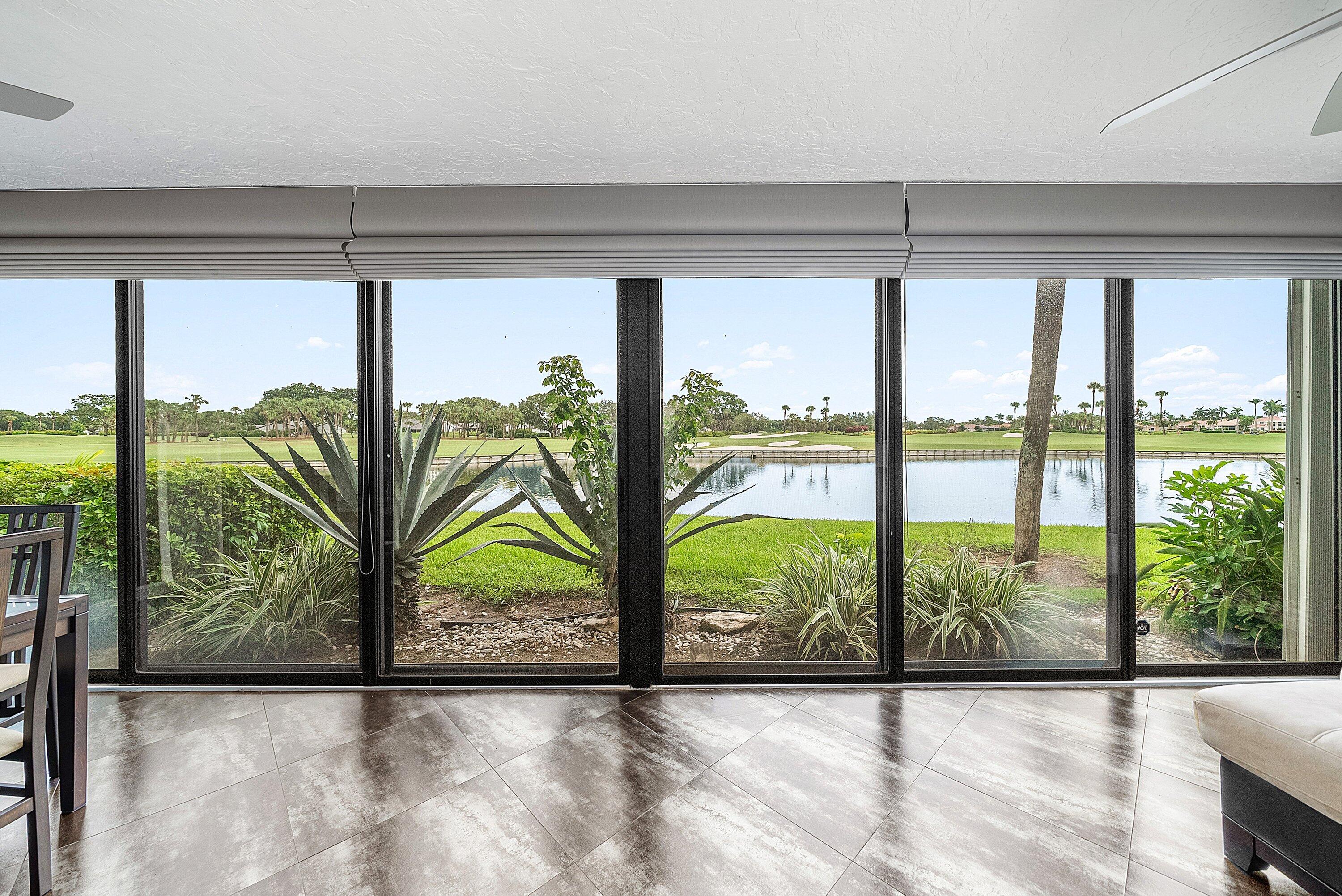 23 Eastgate Drive, Unit C Boynton Beach, FL 33436 - Photo 16 of 71 a view of a room that has a large window