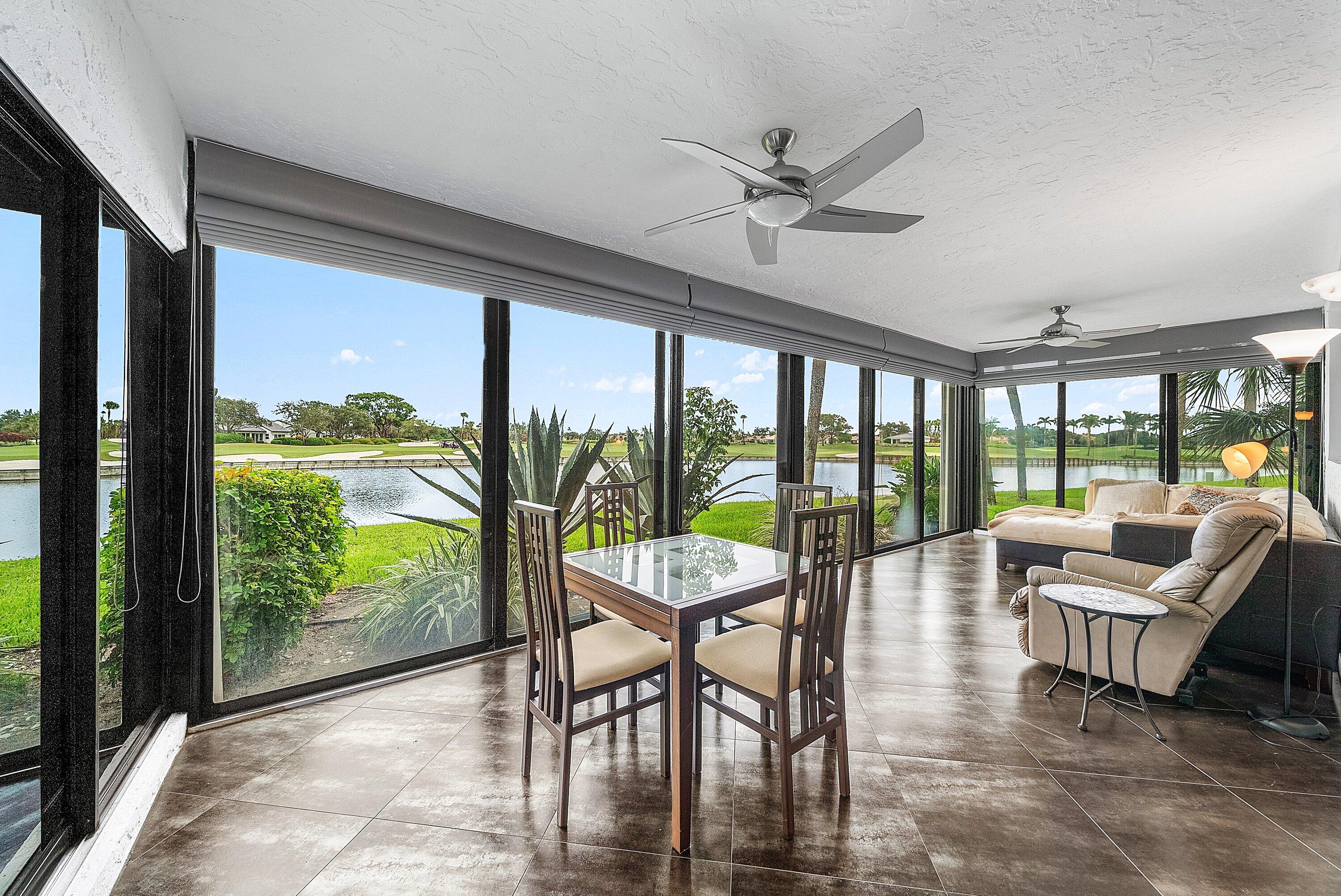 23 Eastgate Drive, Unit C Boynton Beach, FL 33436 - Photo 17 of 71 a living room with furniture and a large window