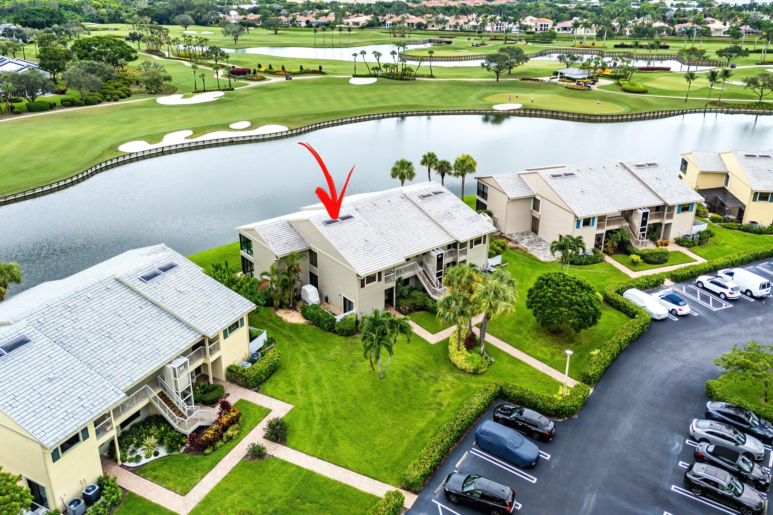 23 Eastgate Drive, Unit C Boynton Beach, FL 33436 - Photo 2 of 71 an aerial view of a house with a big yard