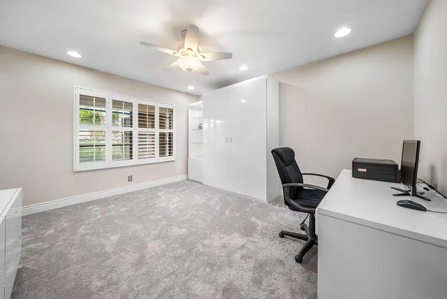 an aerial view of a houses with outdoor space and street view