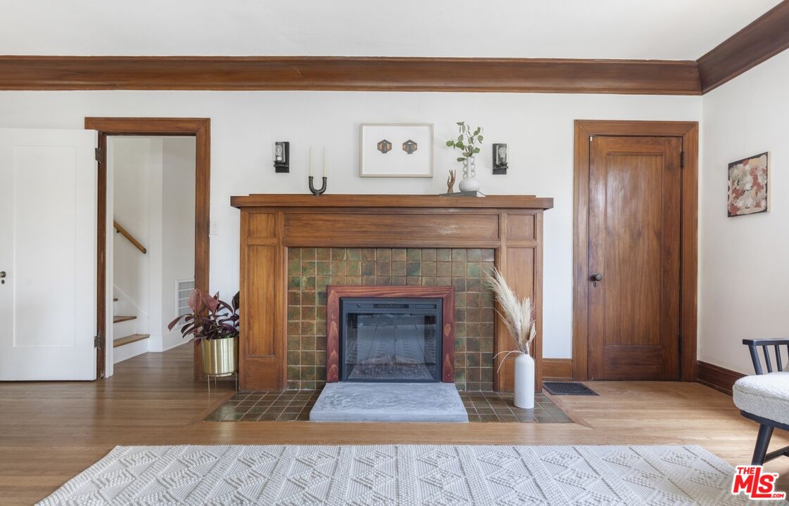 5228 Eagle Rock Boulevard Los Angeles, CA 90041 - Photo 13 of 51 a living room with furniture and a fireplace
