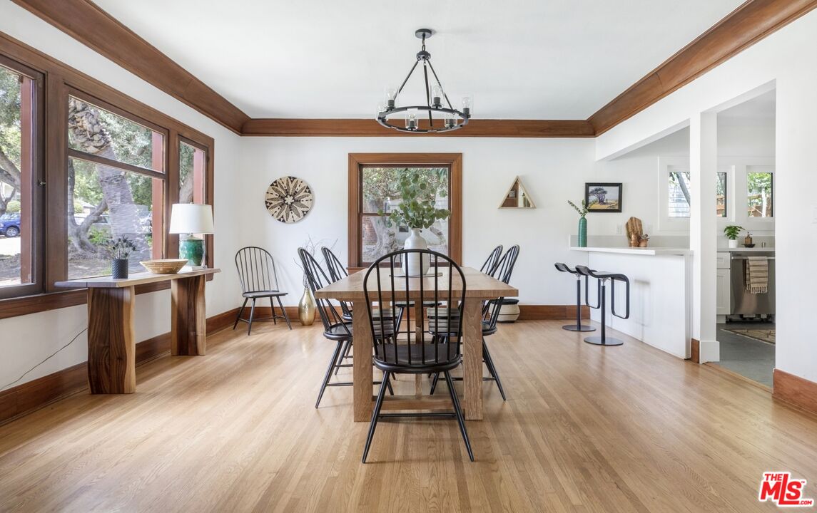 5228 Eagle Rock Boulevard Los Angeles, CA 90041 - Photo 14 of 51 a view of a dining room with furniture window and wooden floor