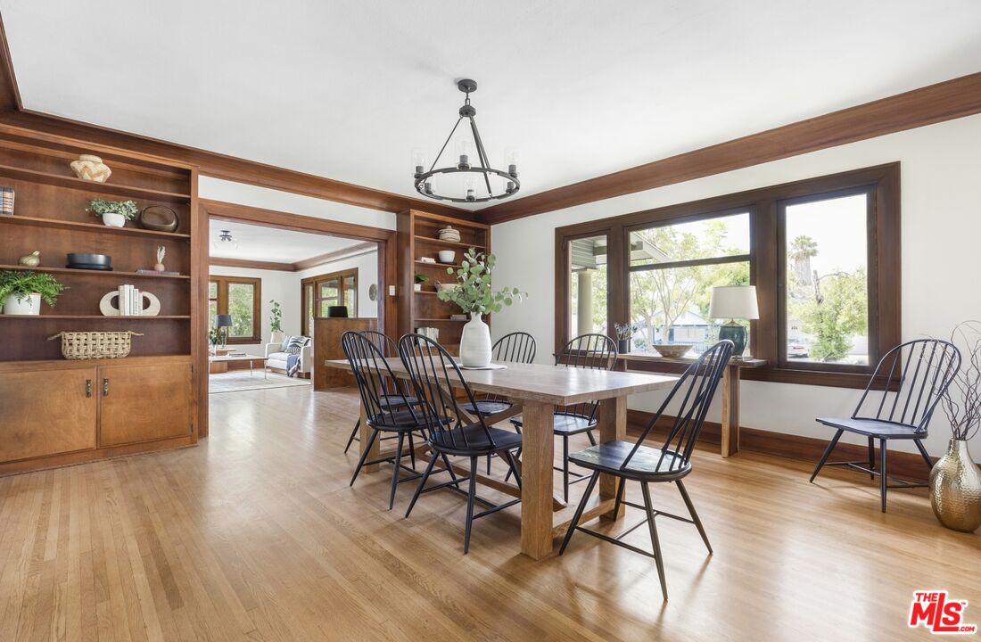 5228 Eagle Rock Boulevard Los Angeles, CA 90041 - Photo 16 of 51 a view of a dining room with furniture window and wooden floor