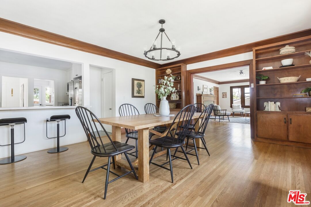 5228 Eagle Rock Boulevard Los Angeles, CA 90041 - Photo 17 of 51 a view of a dining room with furniture window and wooden floor