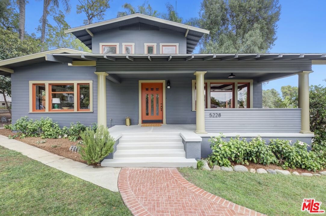 5228 Eagle Rock Boulevard Los Angeles, CA 90041 - Photo 2 of 51 a front view of a house with a yard