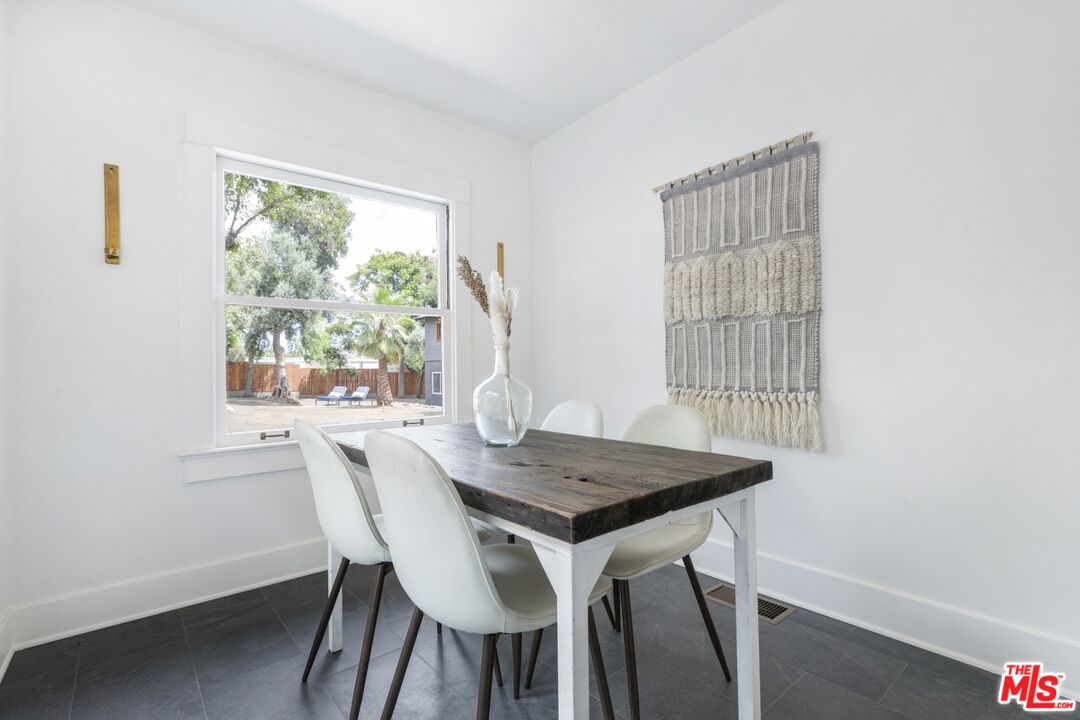 5228 Eagle Rock Boulevard Los Angeles, CA 90041 - Photo 21 of 51 a view of a dining room with furniture and window