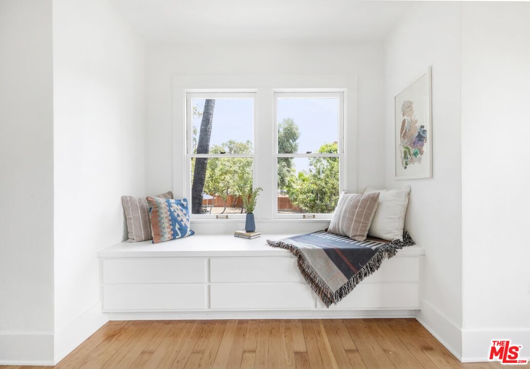 5228 Eagle Rock Boulevard Los Angeles, CA 90041 - Photo 31 of 51 a living room with a large bed and a large window