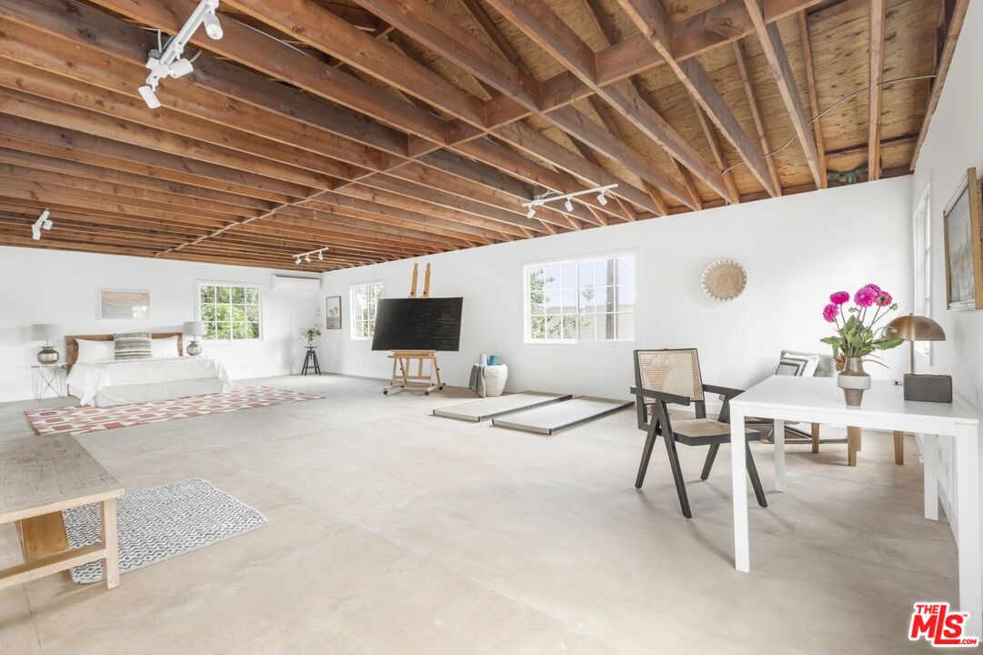 5228 Eagle Rock Boulevard Los Angeles, CA 90041 - Photo 45 of 51 a living room with furniture and a flat screen tv