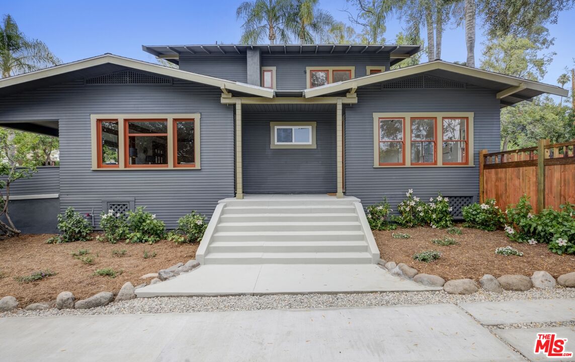 5228 Eagle Rock Boulevard Los Angeles, CA 90041 - Photo 46 of 51 a front view of a house with a yard