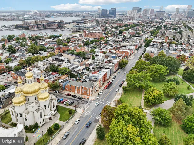 a aerial view of a house with balcony