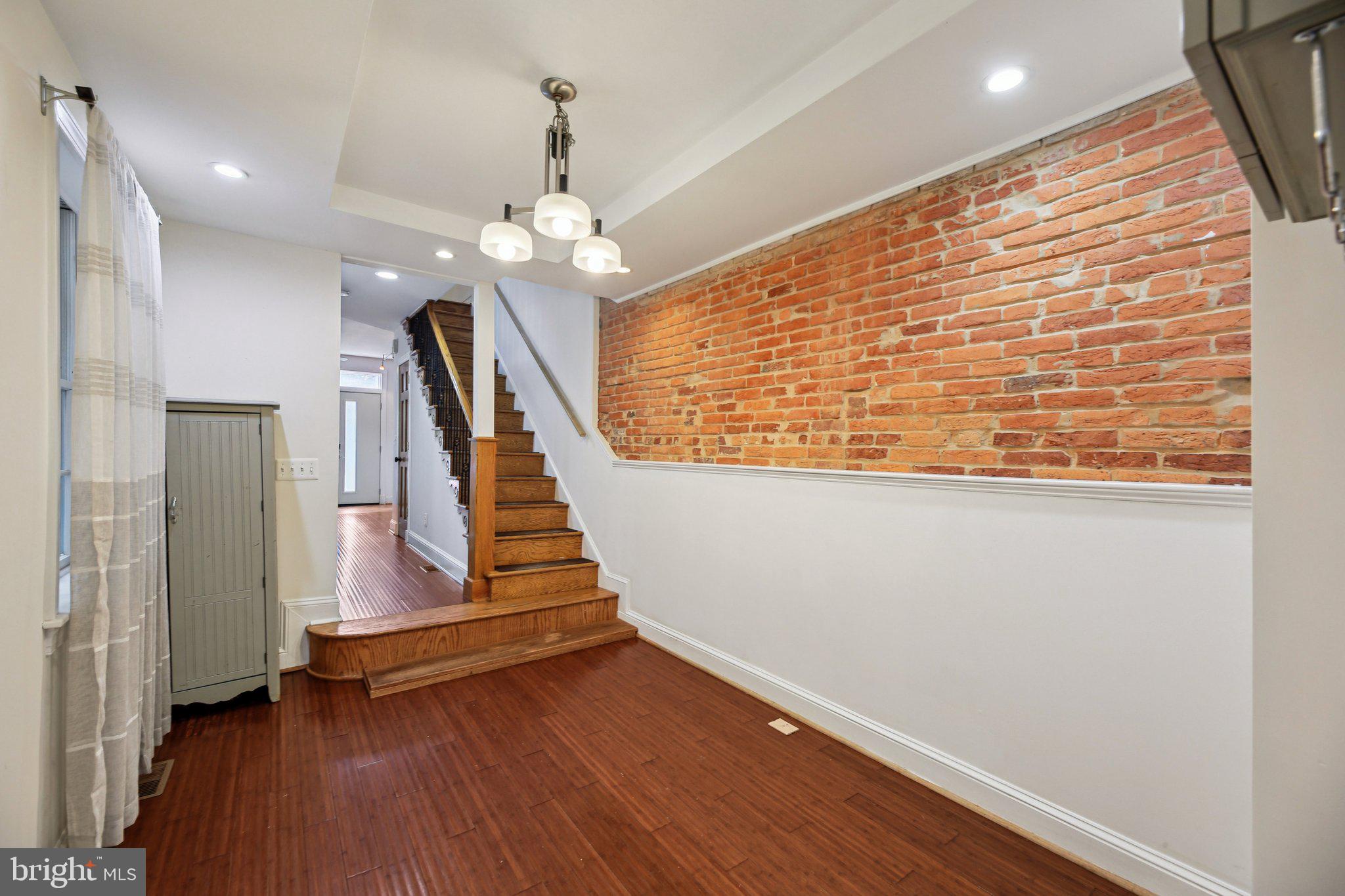 2341 Eastern Avenue Baltimore, MD 21224 - Photo 8 of 43 a view of entryway with wooden floor