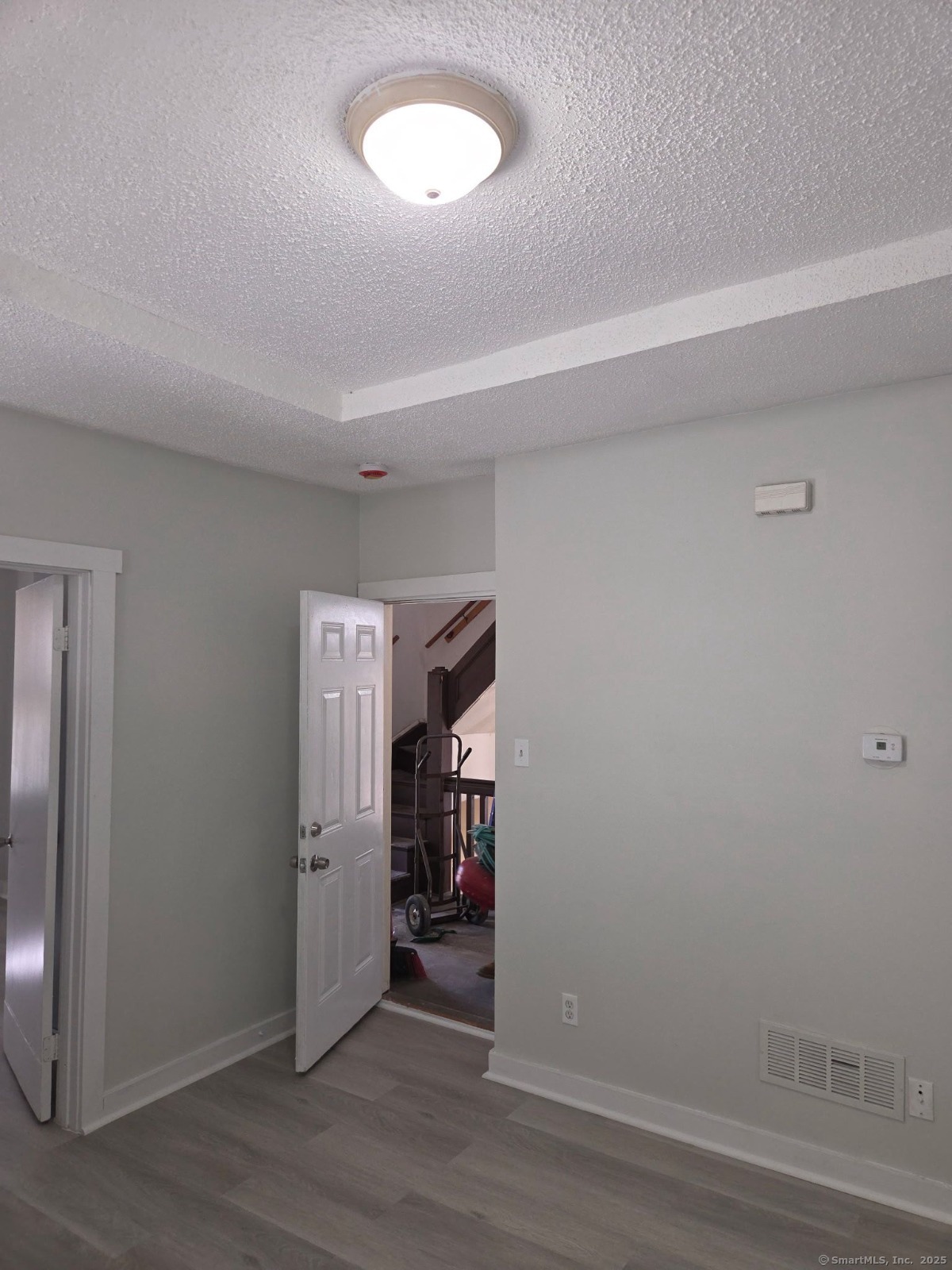 43 Gilbert Avenue New Haven, CT 06511 - Photo 14 of 14 a view of empty room with wooden floor