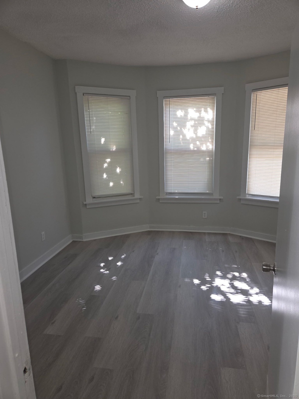 43 Gilbert Avenue New Haven, CT 06511 - Photo 5 of 14 a view of an empty room and window