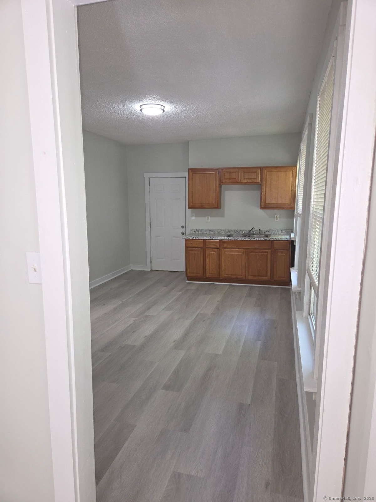43 Gilbert Avenue New Haven, CT 06511 - Photo 7 of 14 a view of a room with wooden floor