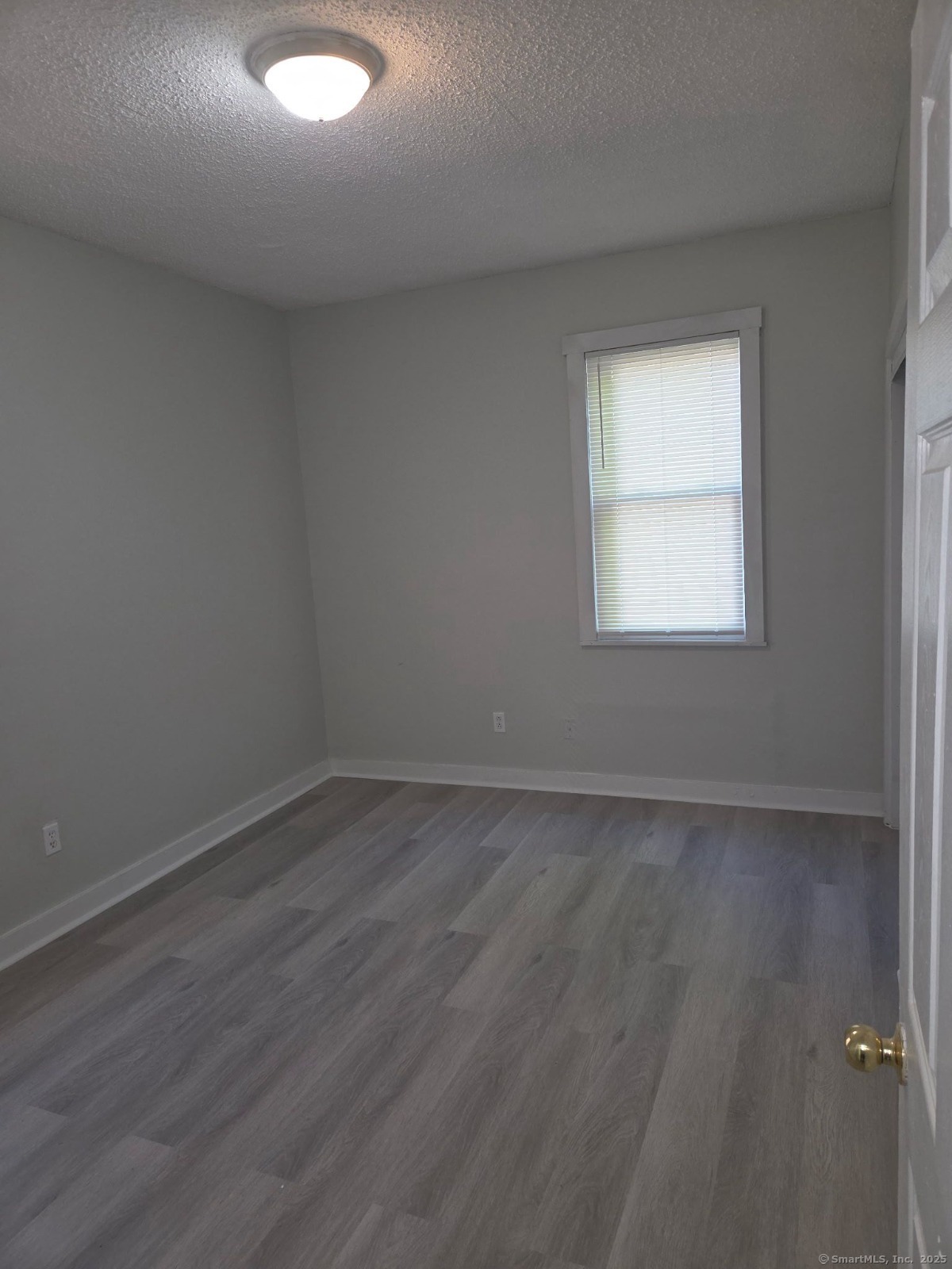 43 Gilbert Avenue New Haven, CT 06511 - Photo 10 of 14 an empty room with a window