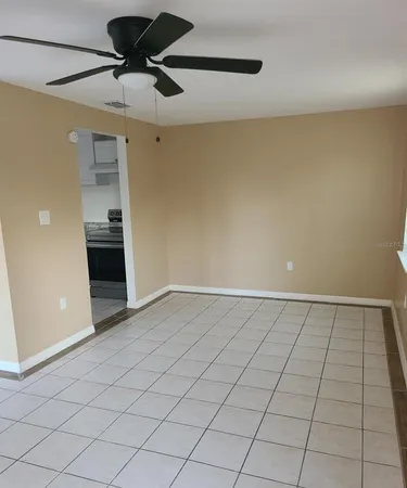 a view of an empty room and window