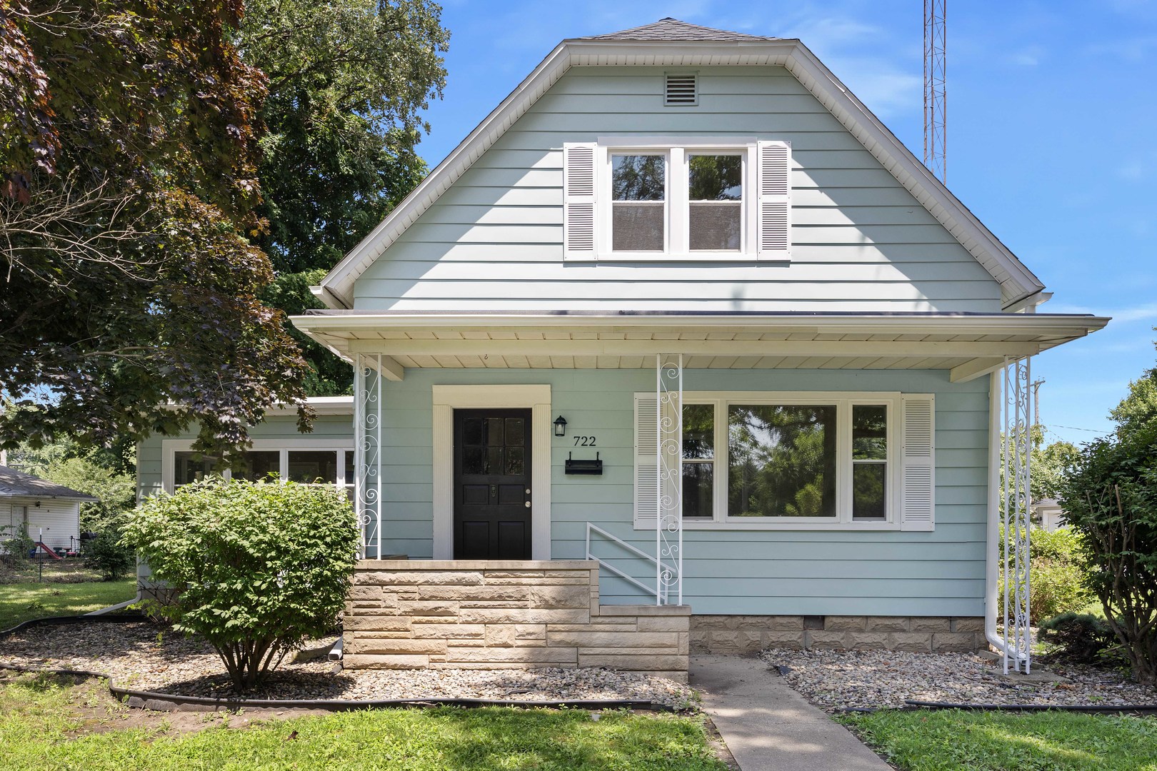 722 East Madison Avenue Chrisman, IL 61924 - Photo 1 of 23 a front view of a house with garden