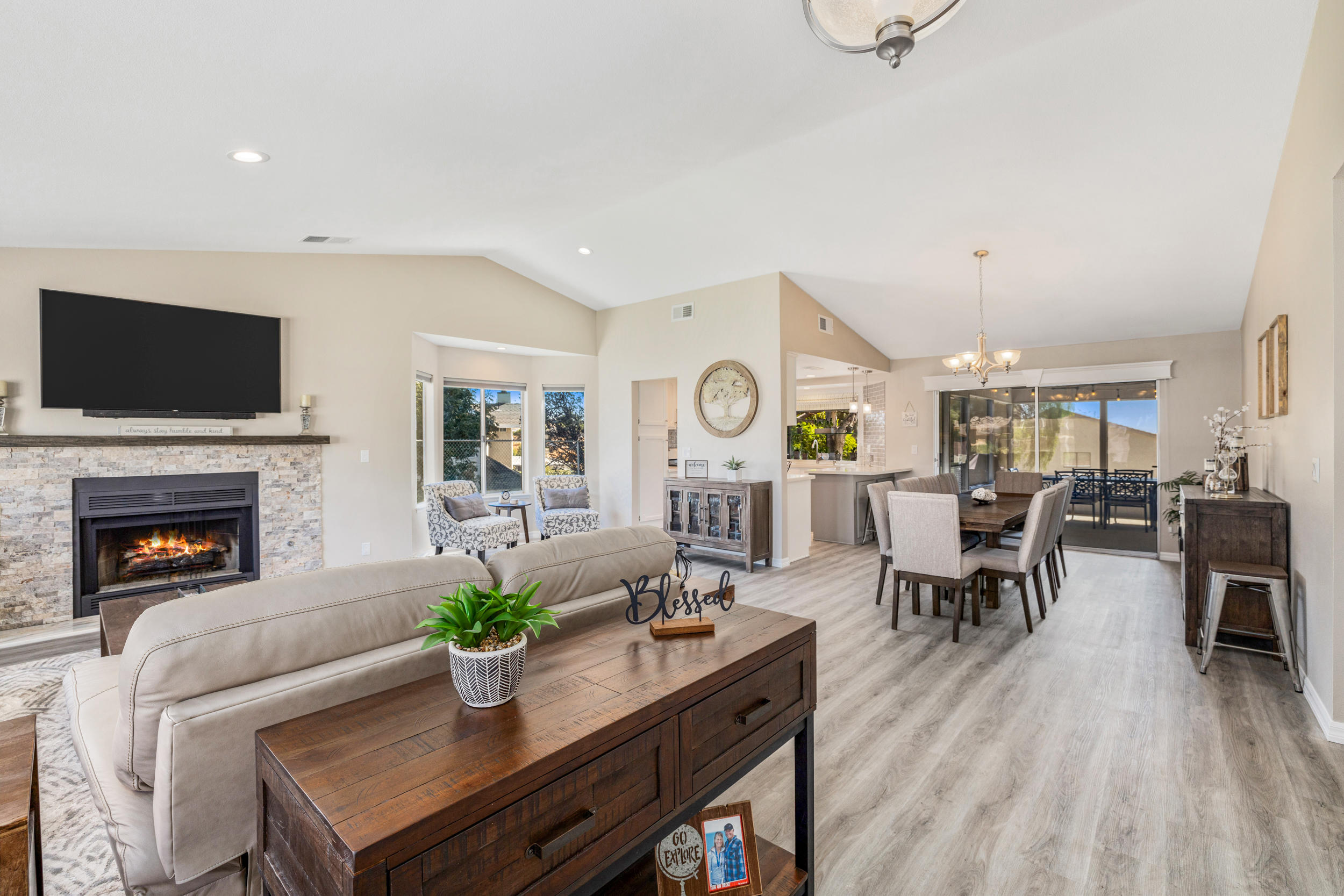 33727 Liberty Road Yucaipa, CA 92399 - Photo 1 of 39 a living room with fireplace furniture and a flat screen tv