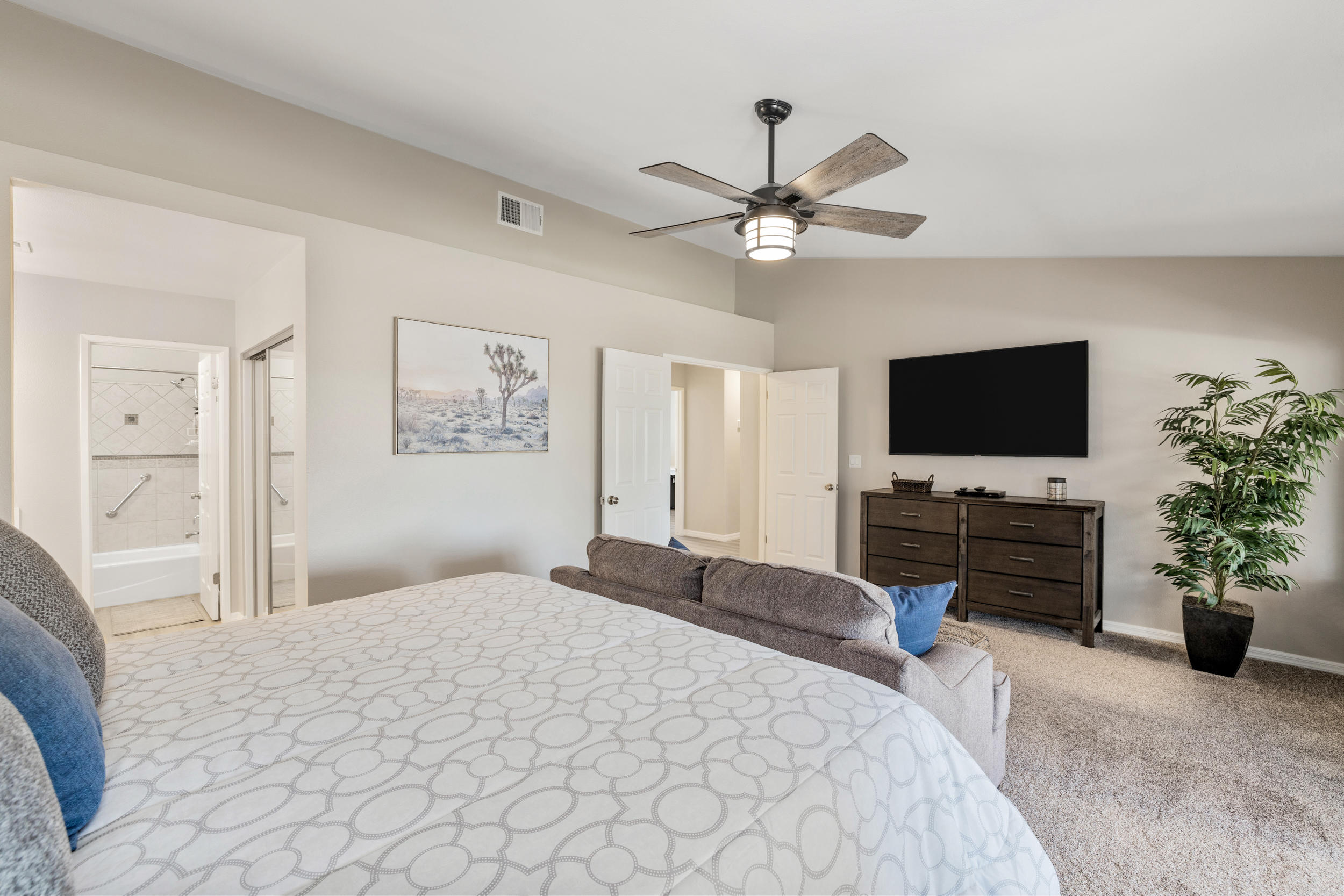 33727 Liberty Road Yucaipa, CA 92399 - Photo 14 of 39 a bedroom with a bed and a flat screen tv
